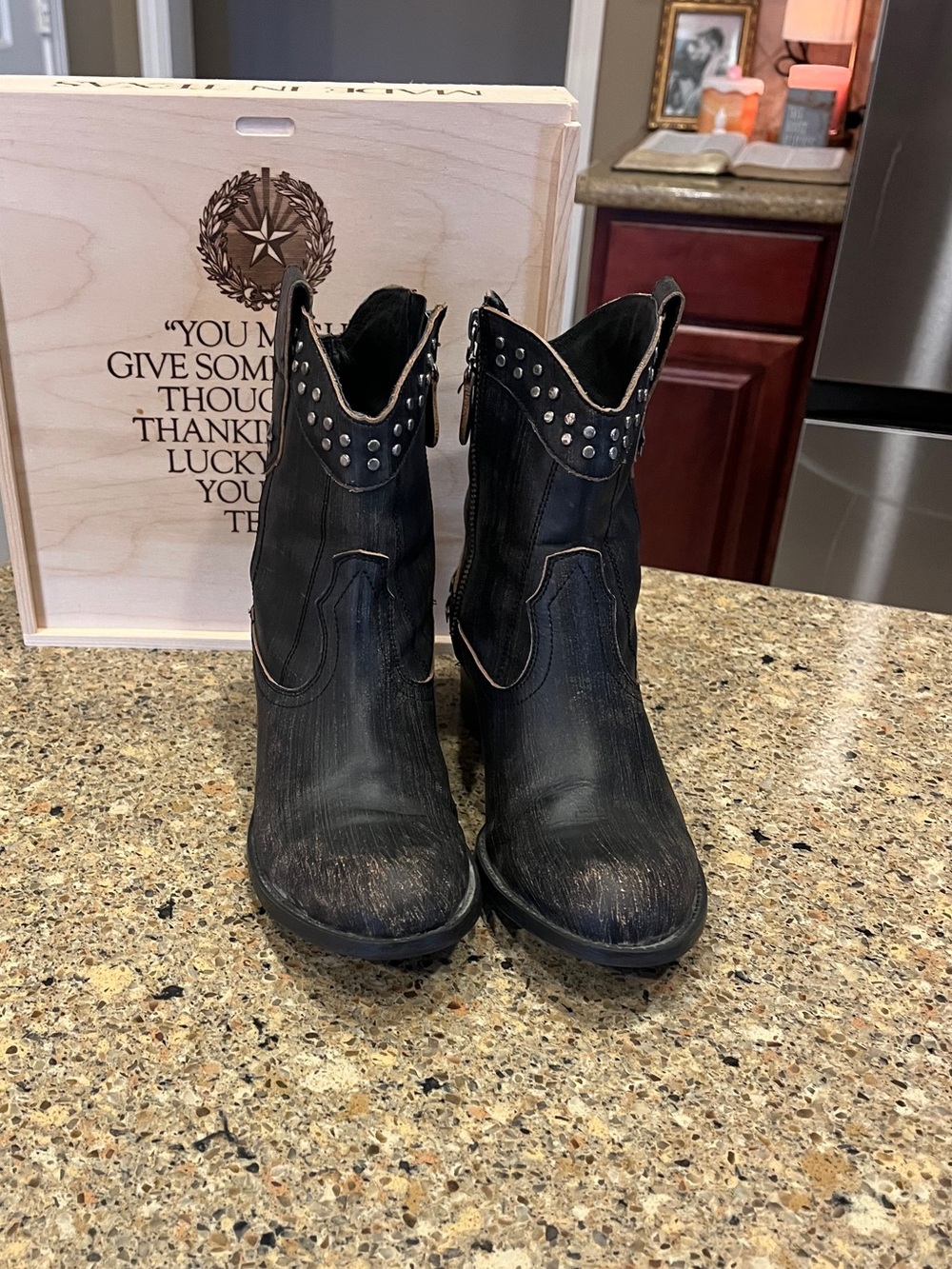 Ladies Guess black western booties with distressed look.
